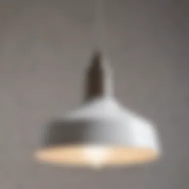 Close-up of small white pendant light showcasing unique materials